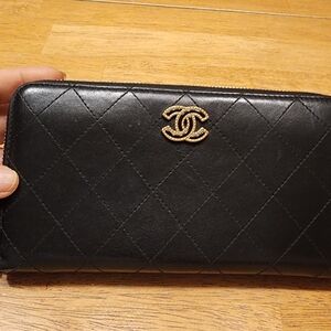 CHANEL Black Quilted Zip Wallet with Gold CC Emblem